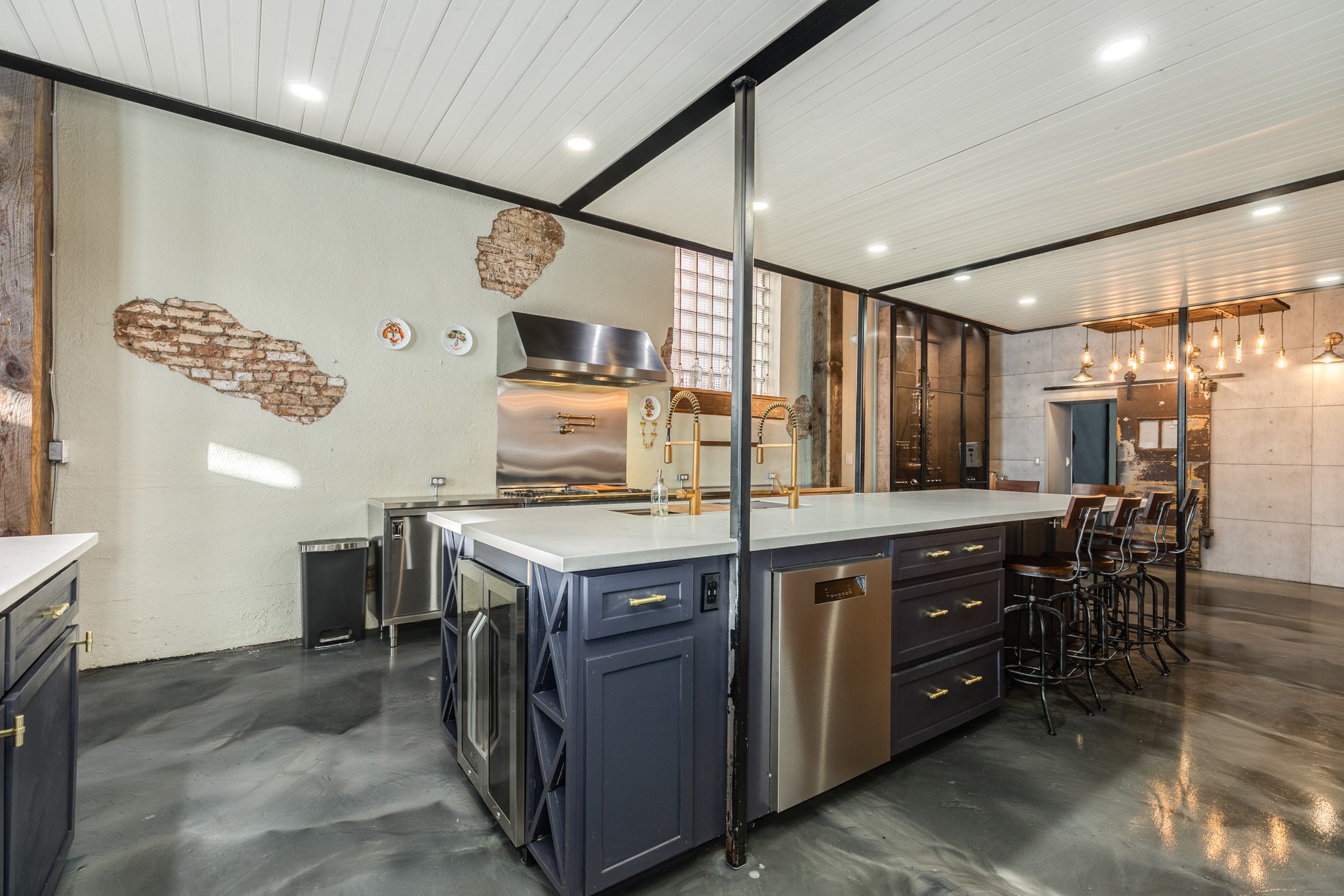 214 Rosenberg Street, Unit 214 Galveston, TX 77550 - Photo 21 of 41 a kitchen with a stove and cabinets