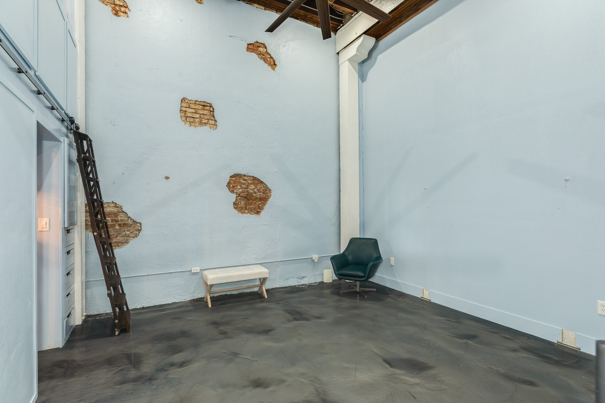 214 Rosenberg Street, Unit 214 Galveston, TX 77550 - Photo 31 of 41 a view of a room with gym equipment