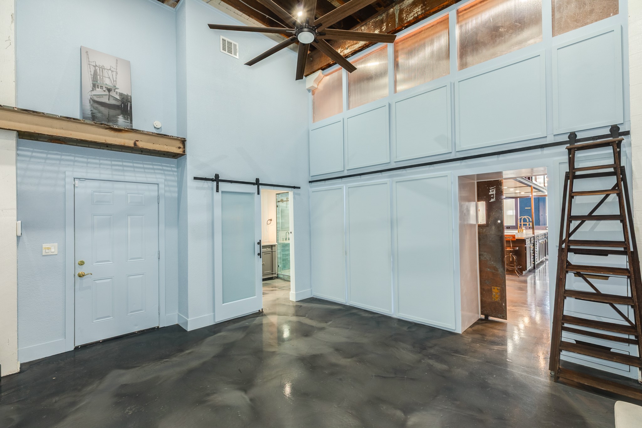 214 Rosenberg Street, Unit 214 Galveston, TX 77550 - Photo 32 of 41 an empty room with closet