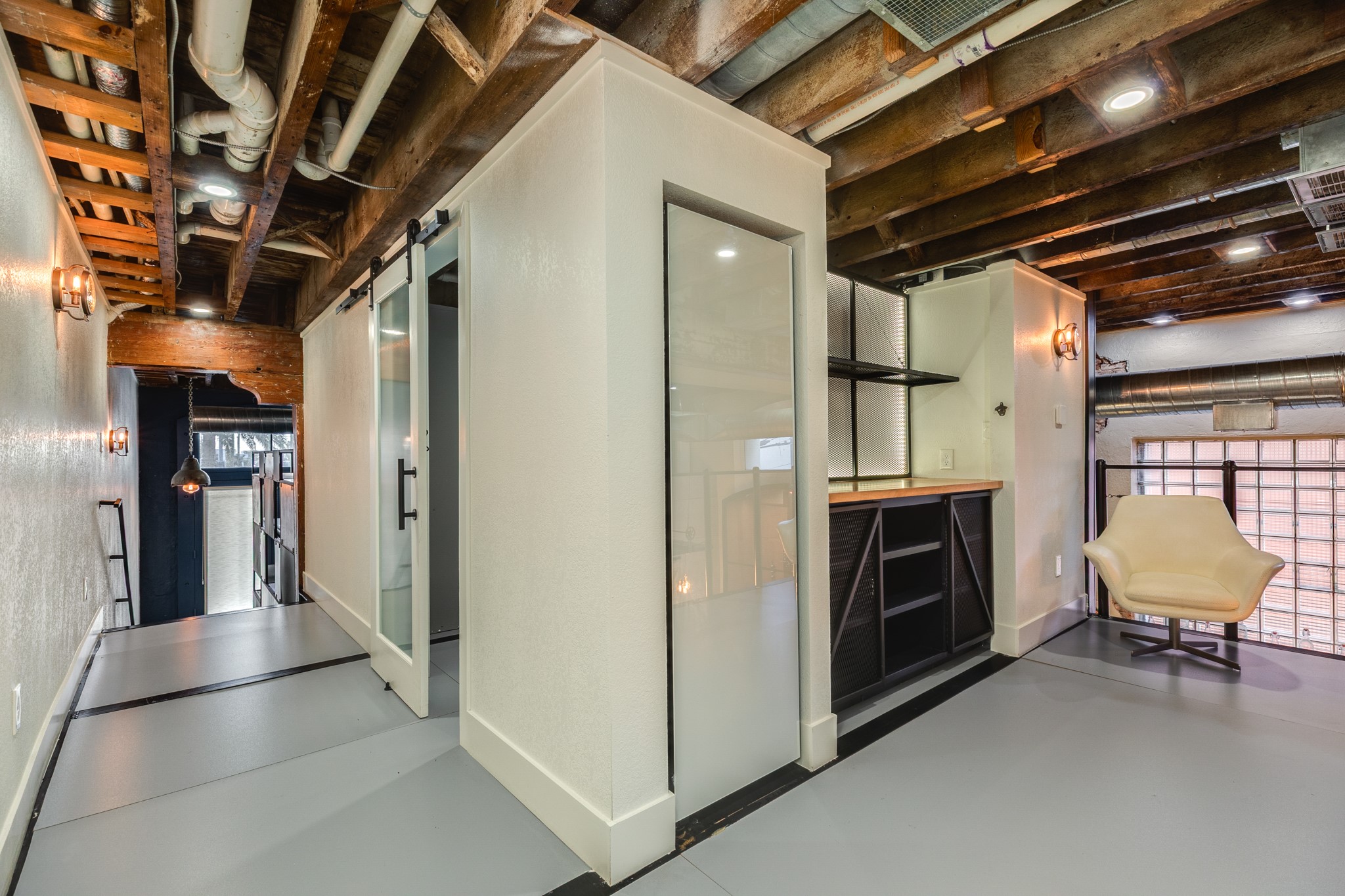 214 Rosenberg Street, Unit 214 Galveston, TX 77550 - Photo 36 of 41 a view of a hallway with entryway