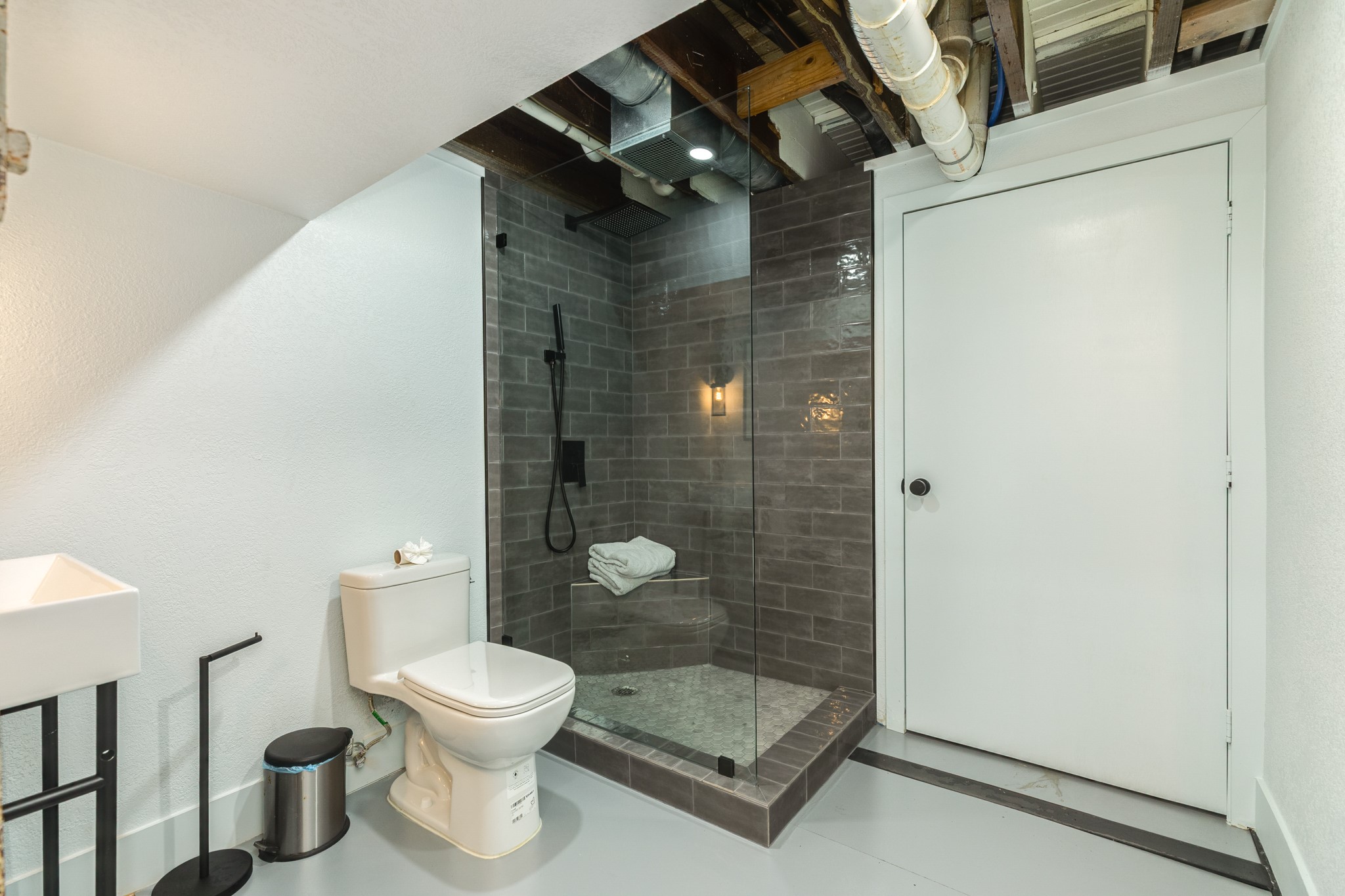 214 Rosenberg Street, Unit 214 Galveston, TX 77550 - Photo 41 of 41 a bathroom with a toilet and a shower