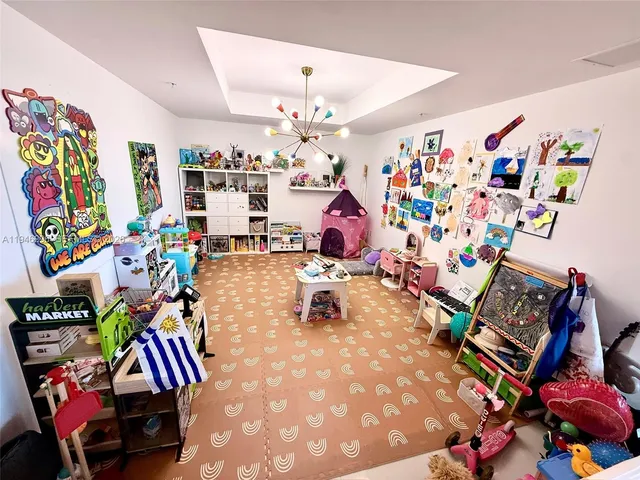 a living room filled with furniture and a couch