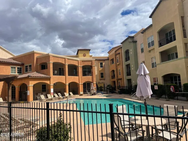a front view of building with balcony