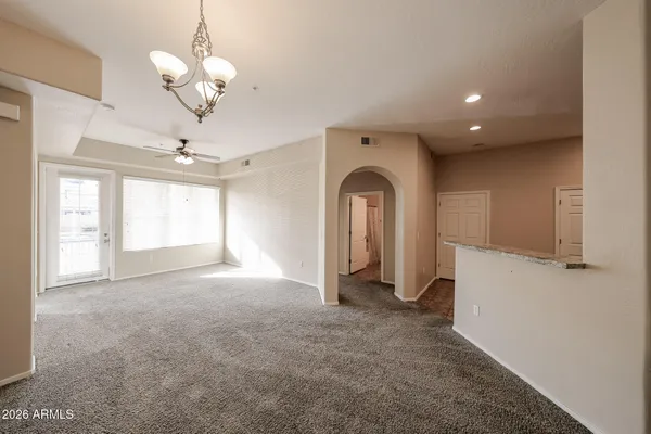 an empty room with a bathroom