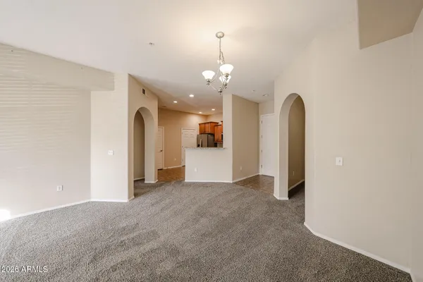 a kitchen with a refrigerator and a sink