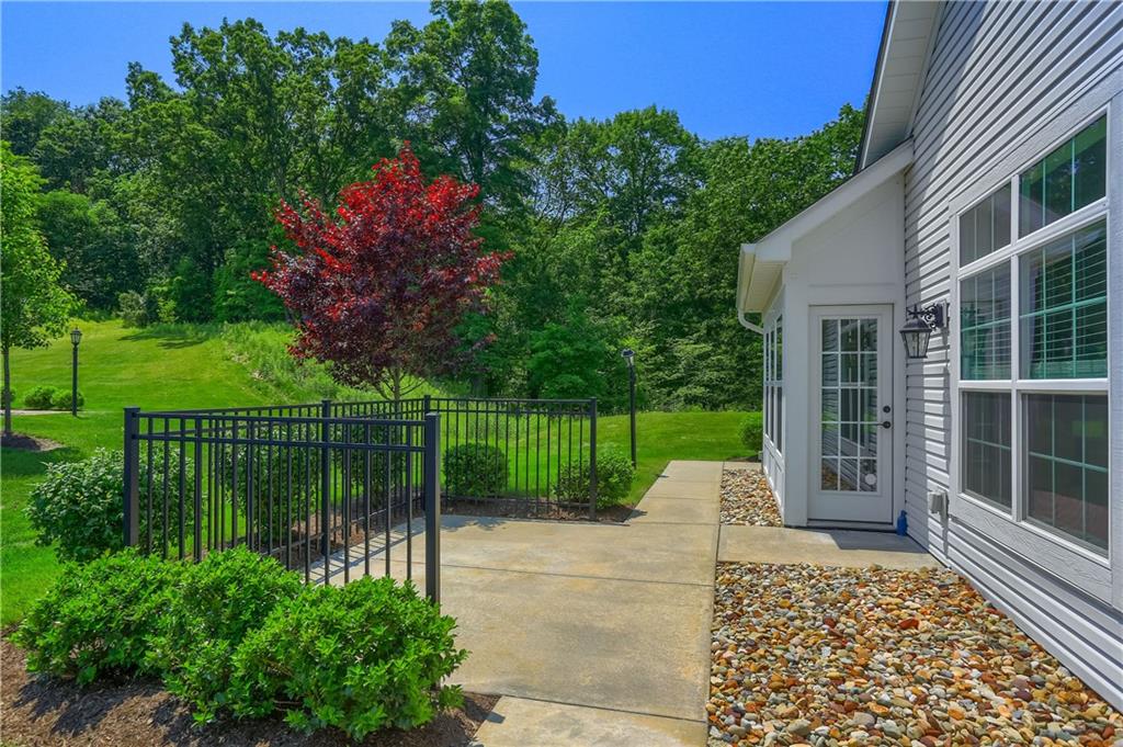 705 Spring Valley Drive Zelienople, PA 16063 - Photo 30 of 34 a garden view with a lake view