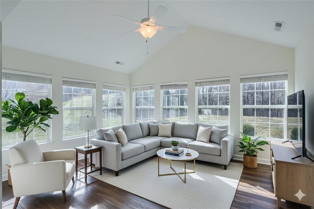 705 Spring Valley Drive Zelienople, PA 16063 - Photo 6 of 34 a living room with furniture potted plant and window