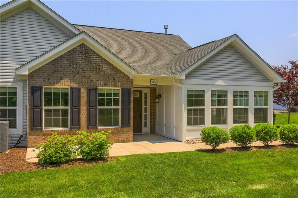 705 Spring Valley Drive Zelienople, PA 16063 - Photo 10 of 34 a view of a house with garden and porch