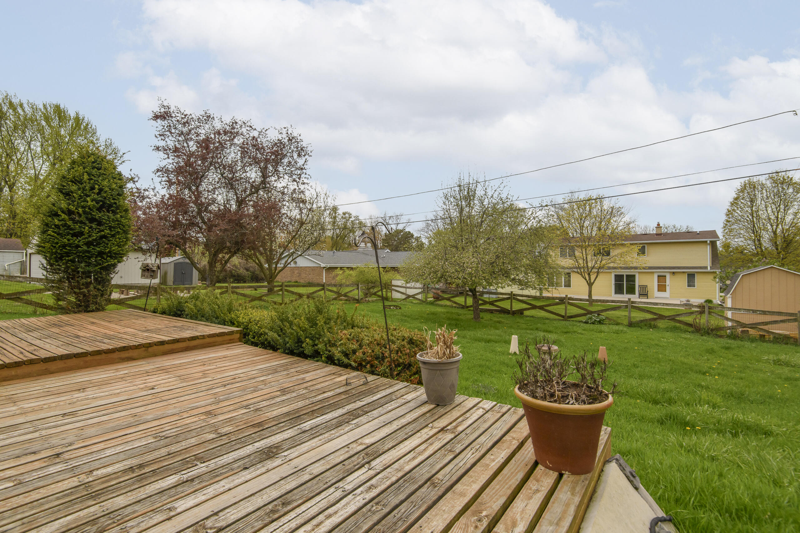 W271N2563 Pear Tree Lane Pewaukee, WI 53072 - Photo 40 of 47 Deck and yard