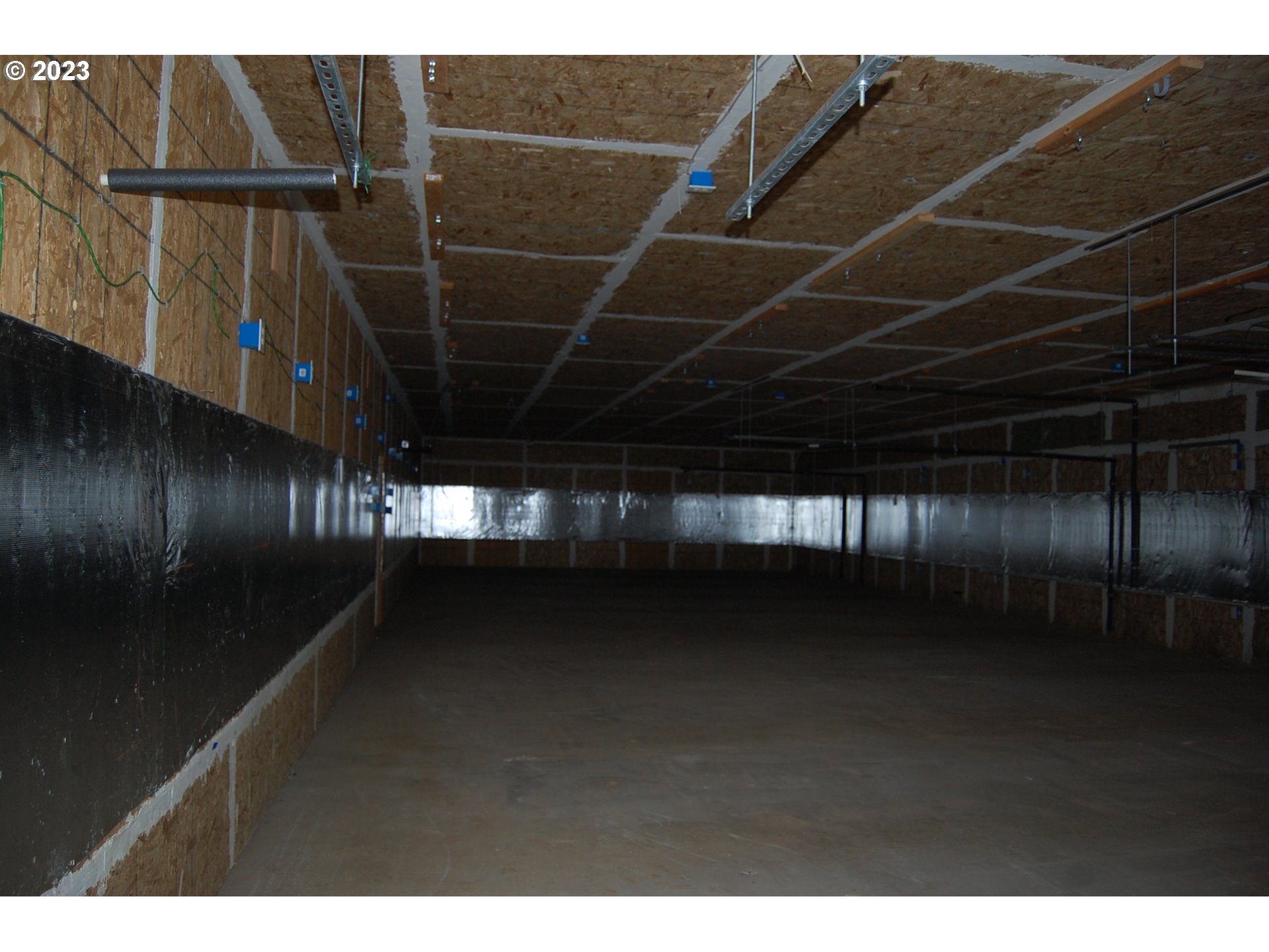 5145 Red Prairie Road Sheridan, OR 97378 - Photo 40 of 43 a view of an empty room with wooden floor