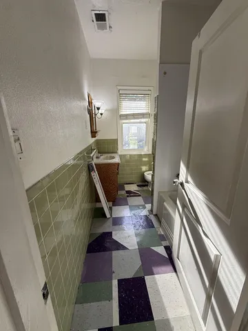 a living room with a rug