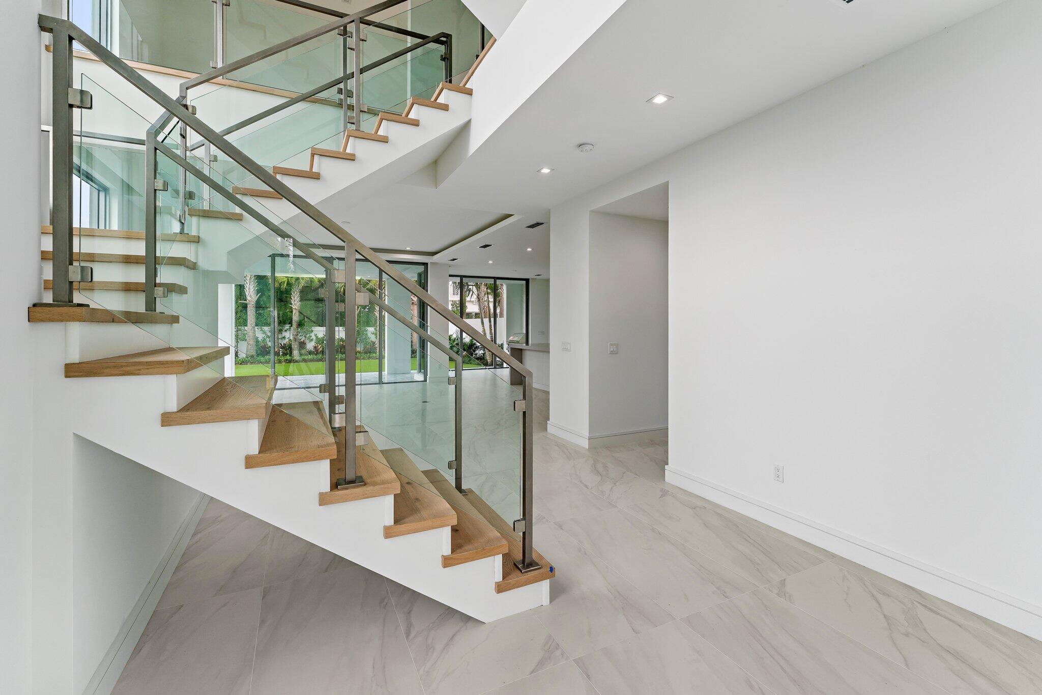 423 Ocean One Lane Juno Beach, FL 33408 - Photo 14 of 58 a view of a hall with an entryway