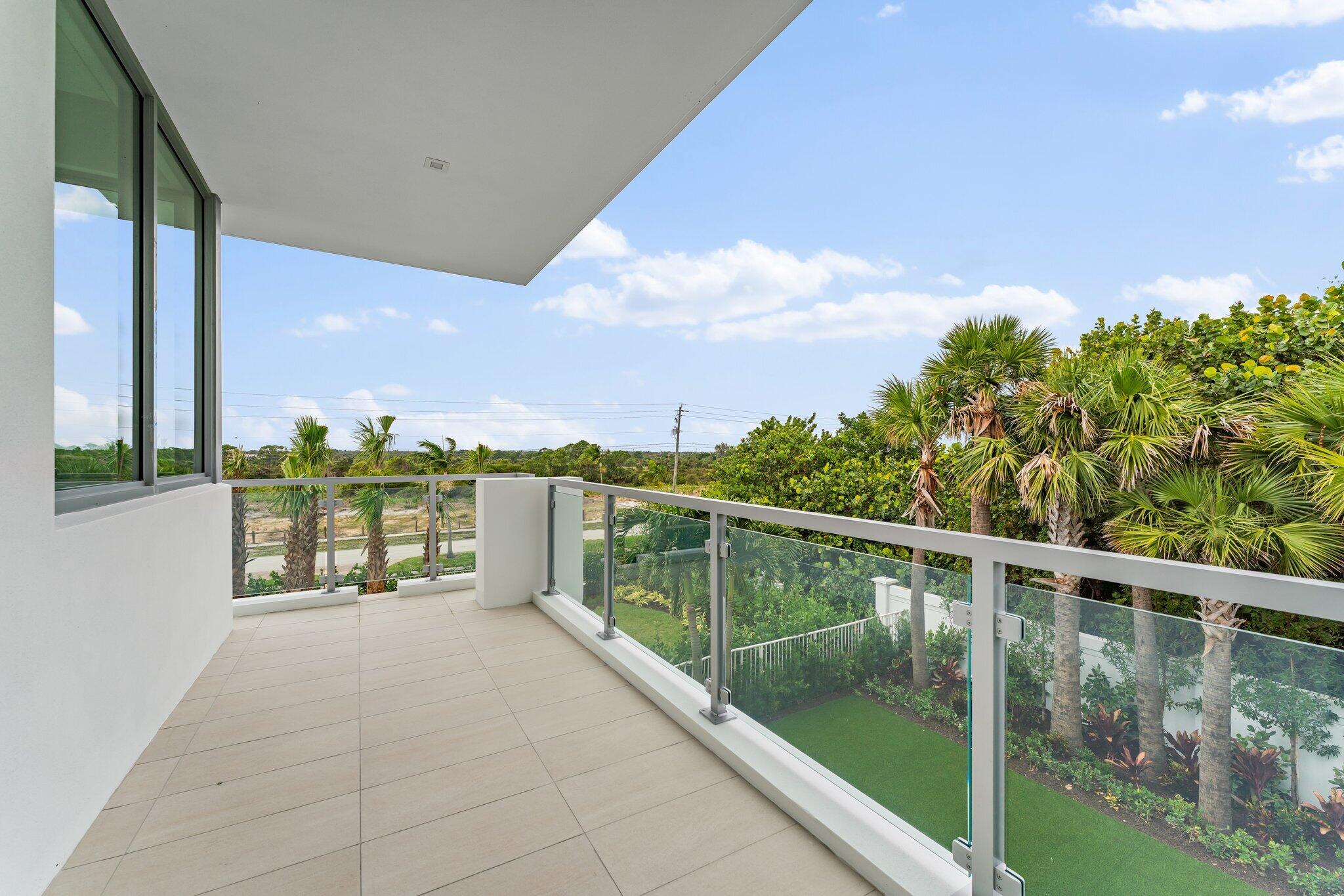 423 Ocean One Lane Juno Beach, FL 33408 - Photo 34 of 58 a view of balcony with city view