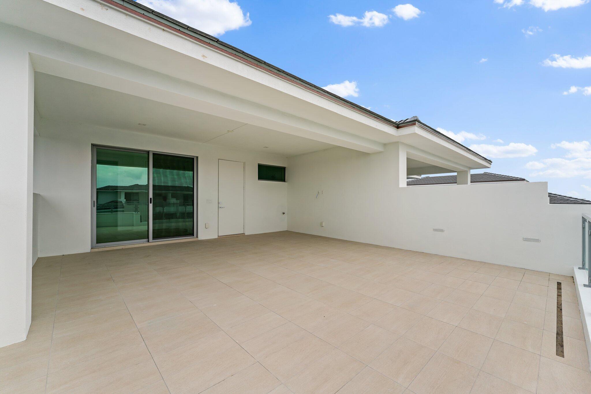 423 Ocean One Lane Juno Beach, FL 33408 - Photo 51 of 58 a view of an empty room with a window