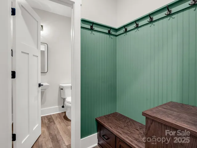 a view of a bathroom with a shower and a sink