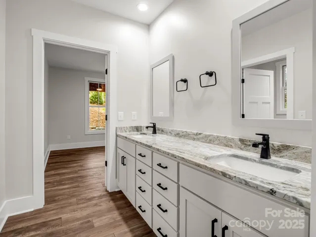 a bathroom with a bath tub and a shower