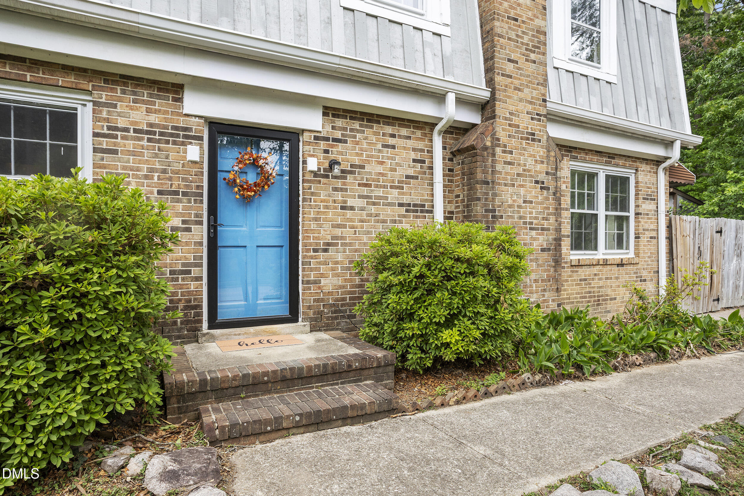 1801 Quail Ridge Road Raleigh, NC 27609 - Photo 28 of 29 a front view of a house with a garden