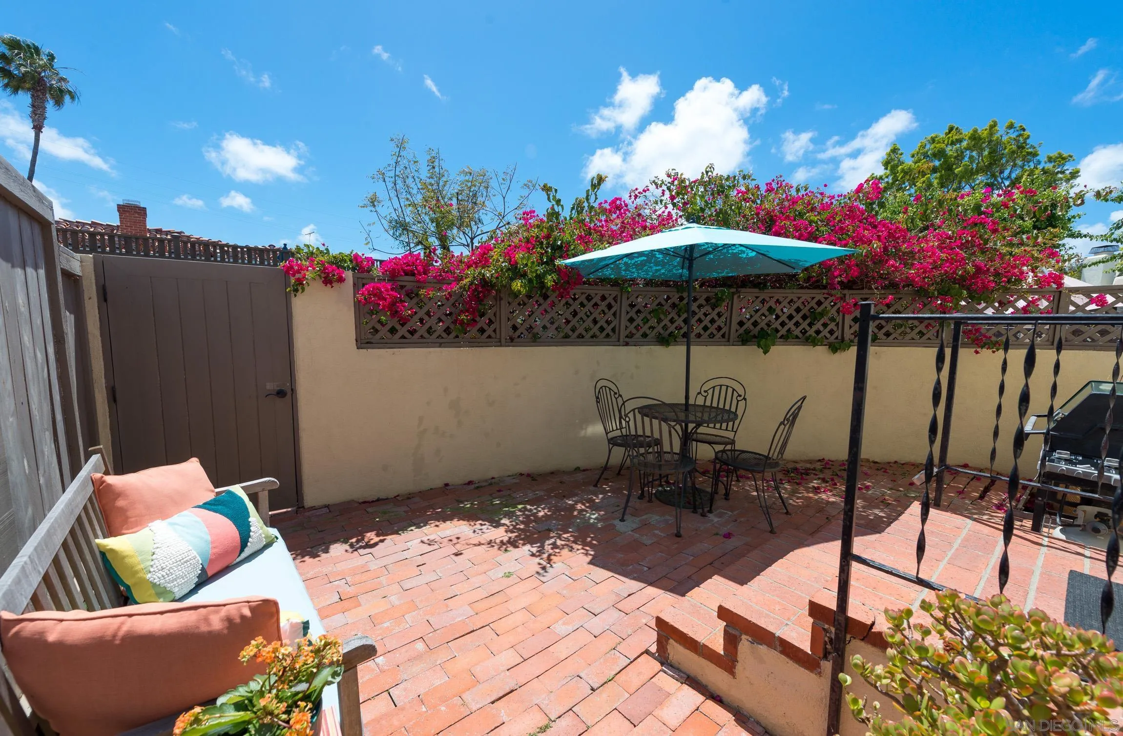605 Arenas Street La Jolla, CA 92037 - Photo 22 of 25 a outdoor living space with furniture and a potted plant