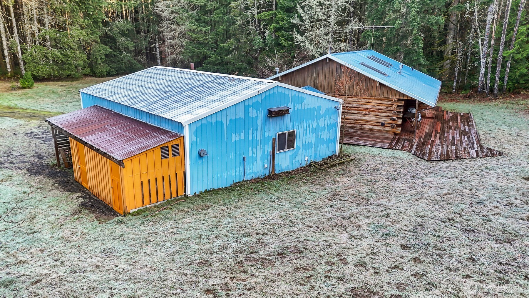 194 Piper Lane Chehalis, WA 98532 - Photo 23 of 40 a view of a wooden house with a yard