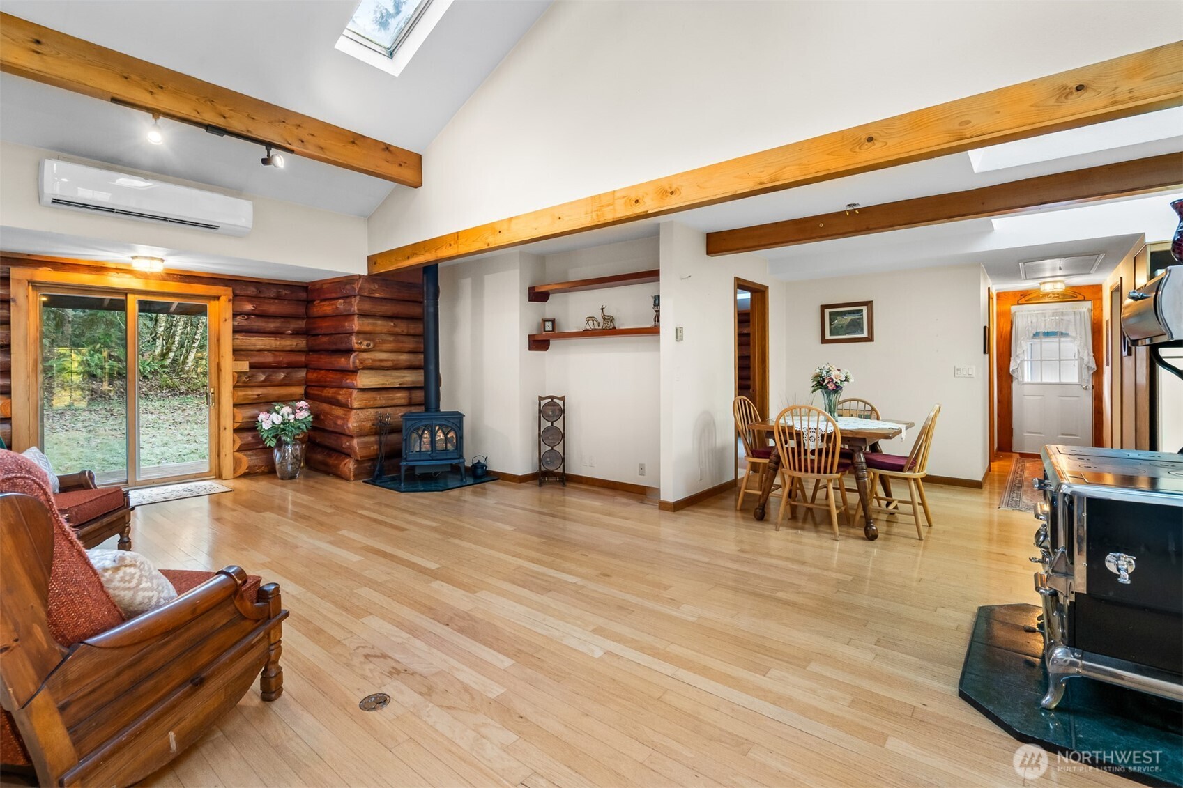 194 Piper Lane Chehalis, WA 98532 - Photo 7 of 40 a living room with furniture and a floor to ceiling window