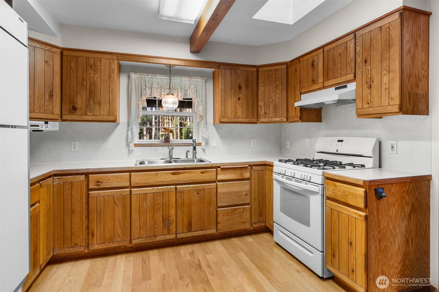 194 Piper Lane Chehalis, WA 98532 - Photo 9 of 40 a kitchen with stainless steel appliances granite countertop a sink stove and cabinets