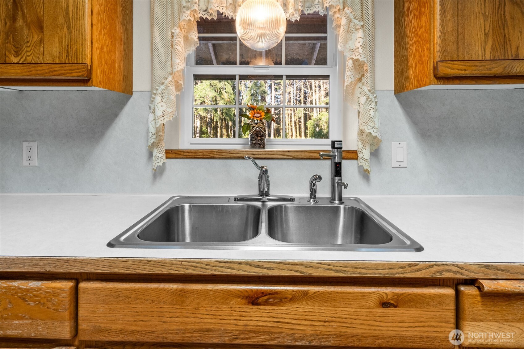 194 Piper Lane Chehalis, WA 98532 - Photo 10 of 40 a kitchen with a sink and a window