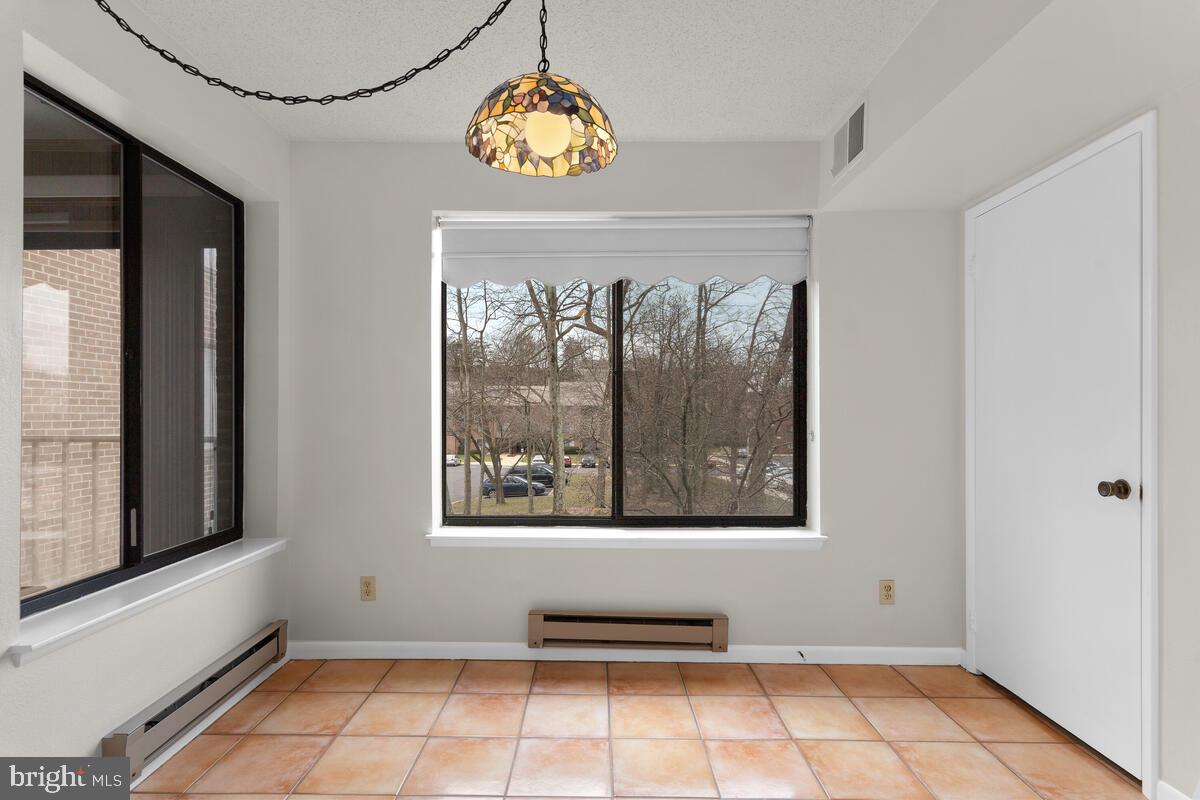 15311 Beaverbrook Court, Unit 902D Silver Spring, MD 20906 - Photo 11 of 30 Dining Area w/Two Windows