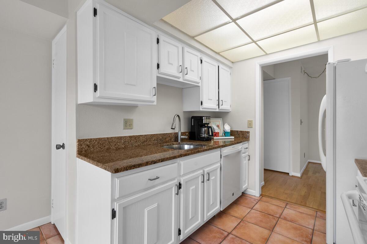 15311 Beaverbrook Court, Unit 902D Silver Spring, MD 20906 - Photo 15 of 30 Ample Cabinets With Slide Out Shelves