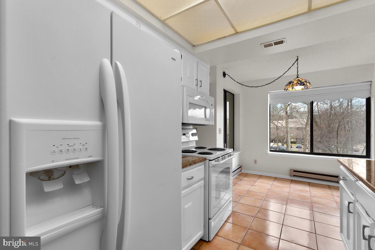 15311 Beaverbrook Court, Unit 902D Silver Spring, MD 20906 - Photo 17 of 30 Side-by-Side Refrigerator