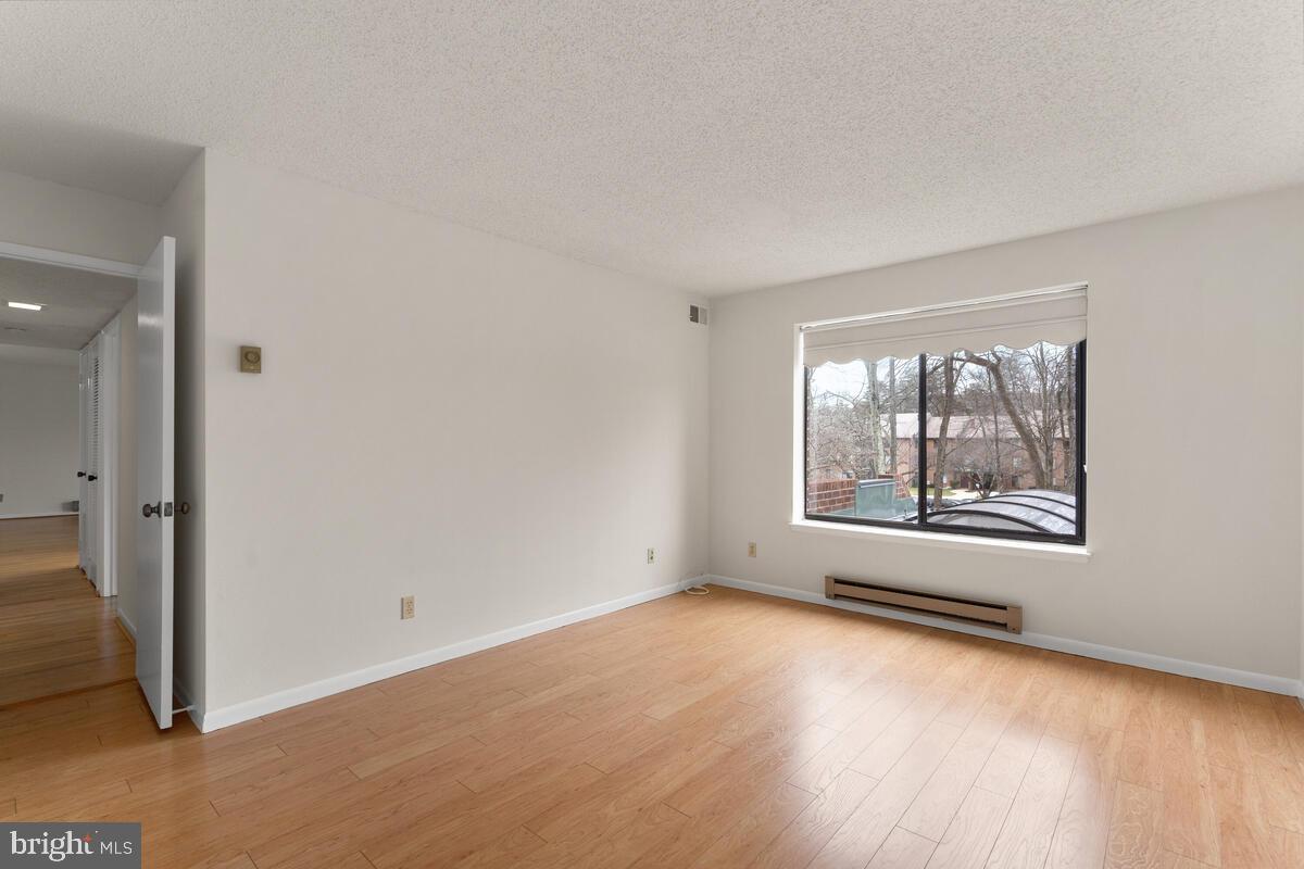 15311 Beaverbrook Court, Unit 902D Silver Spring, MD 20906 - Photo 25 of 30 Primary Bedroom