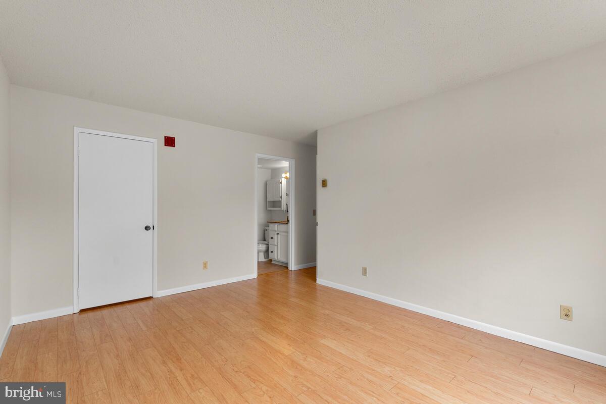 15311 Beaverbrook Court, Unit 902D Silver Spring, MD 20906 - Photo 26 of 30 Primary Bedroom w/Walk-In Closet