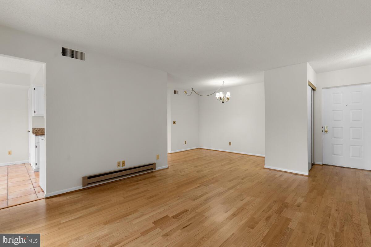15311 Beaverbrook Court, Unit 902D Silver Spring, MD 20906 - Photo 7 of 30 Spacious Living Room and Dining Room