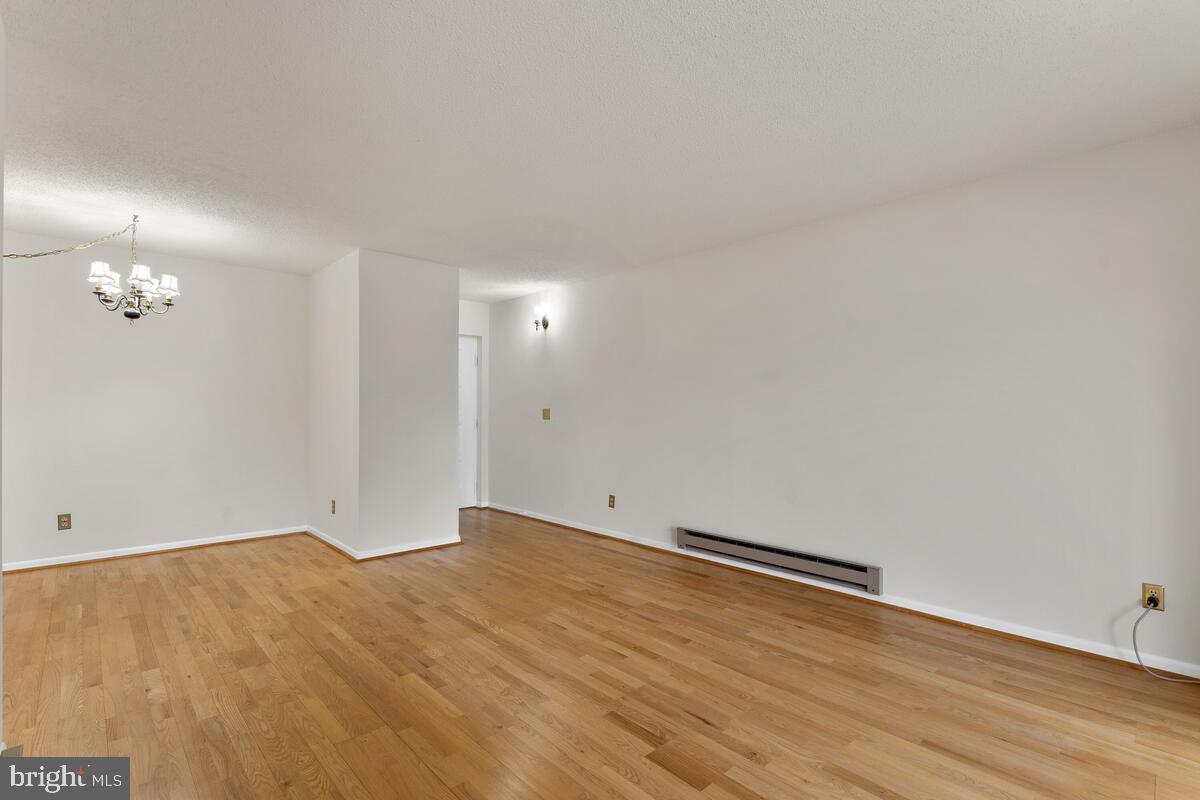 15311 Beaverbrook Court, Unit 902D Silver Spring, MD 20906 - Photo 8 of 30 Entry to Living Room From Kitchen