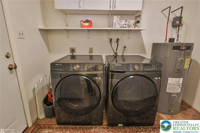 a blue sign that is sitting in front of a house