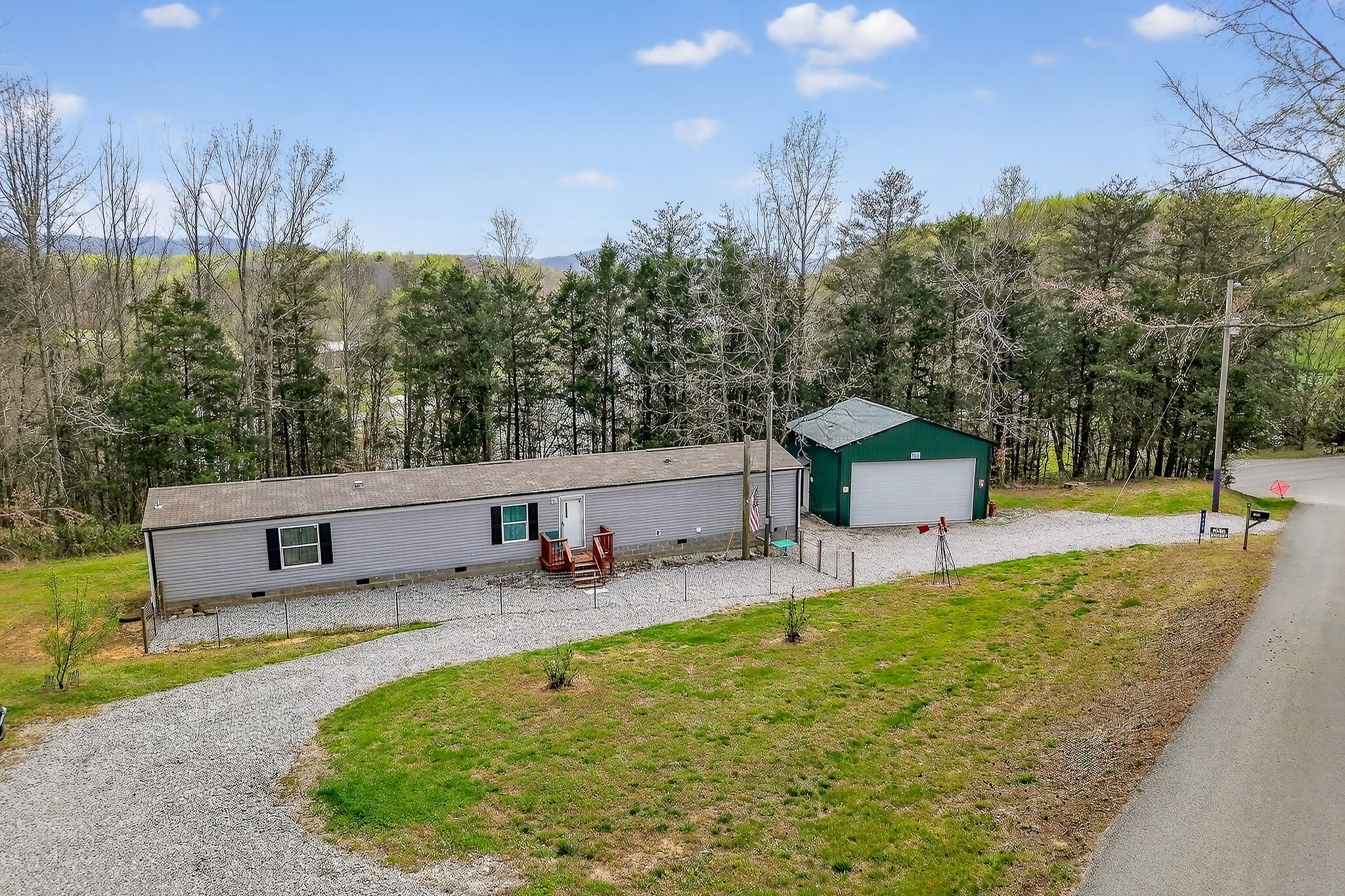 1237 Ridge Road Quebeck, TN 38579 - Photo 13 of 47 a view of a house with backyard and sitting area