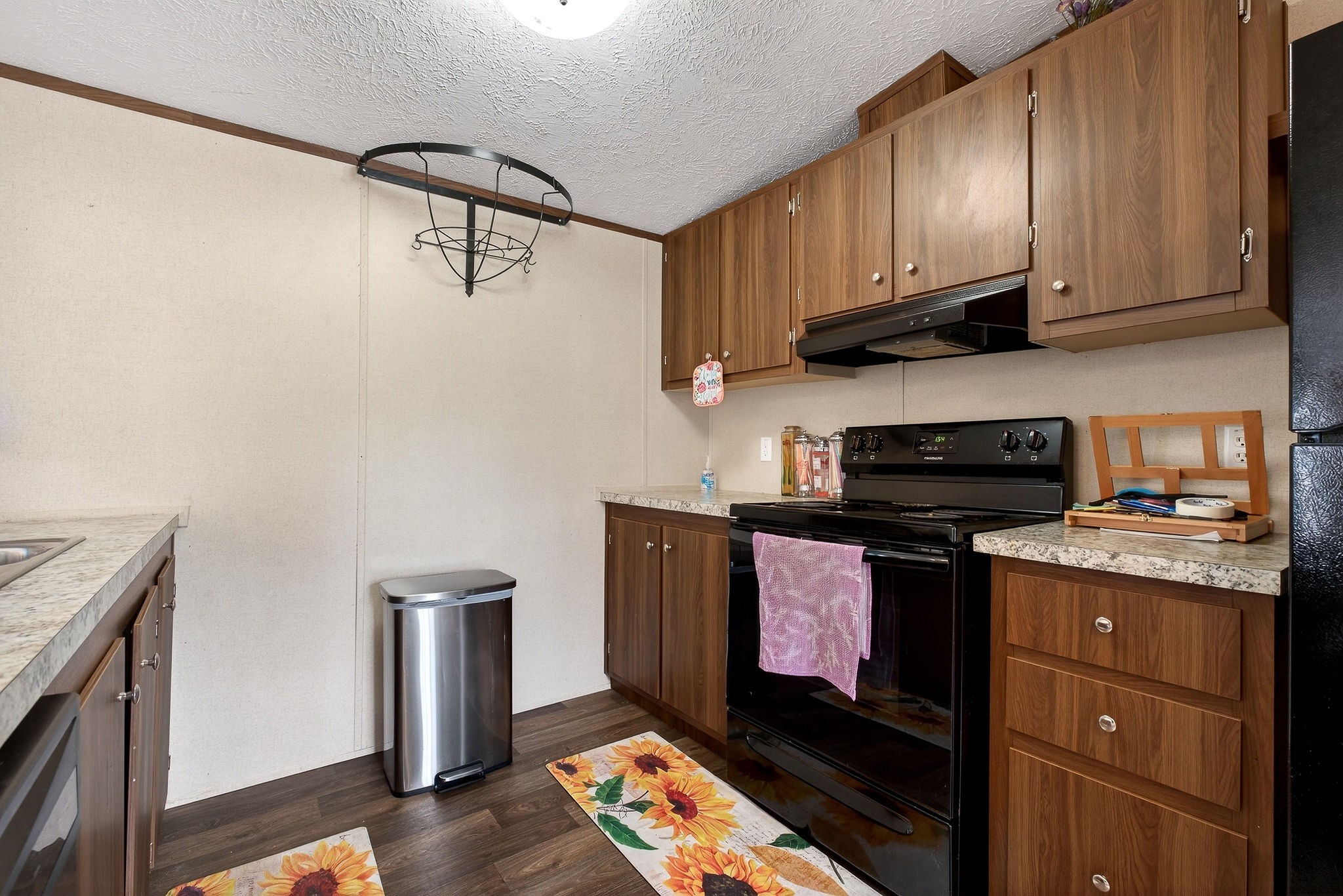1237 Ridge Road Quebeck, TN 38579 - Photo 19 of 47 a kitchen with stainless steel appliances granite countertop a stove and a microwave