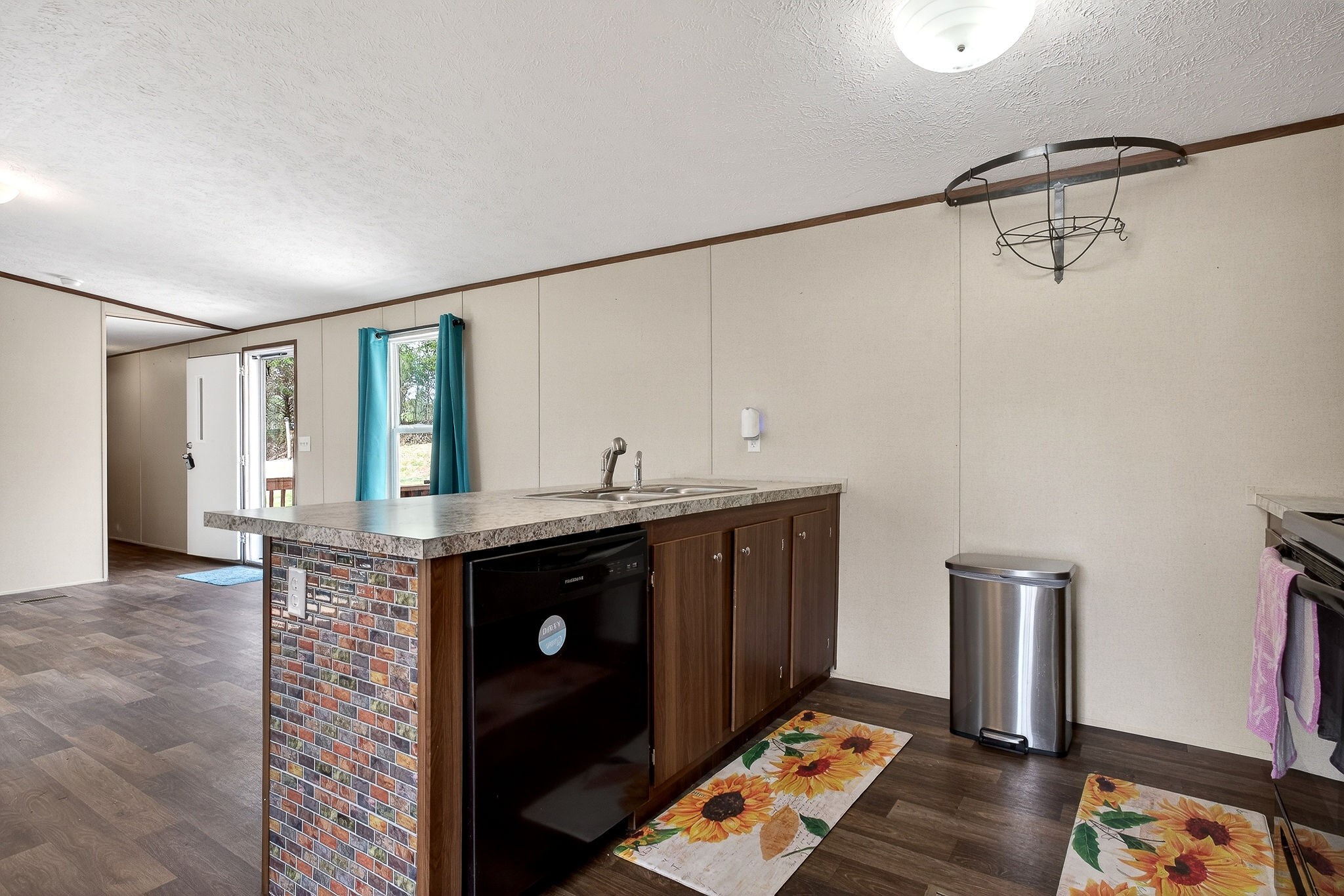 1237 Ridge Road Quebeck, TN 38579 - Photo 20 of 47 a kitchen with stainless steel appliances granite countertop a sink and wooden cabinets
