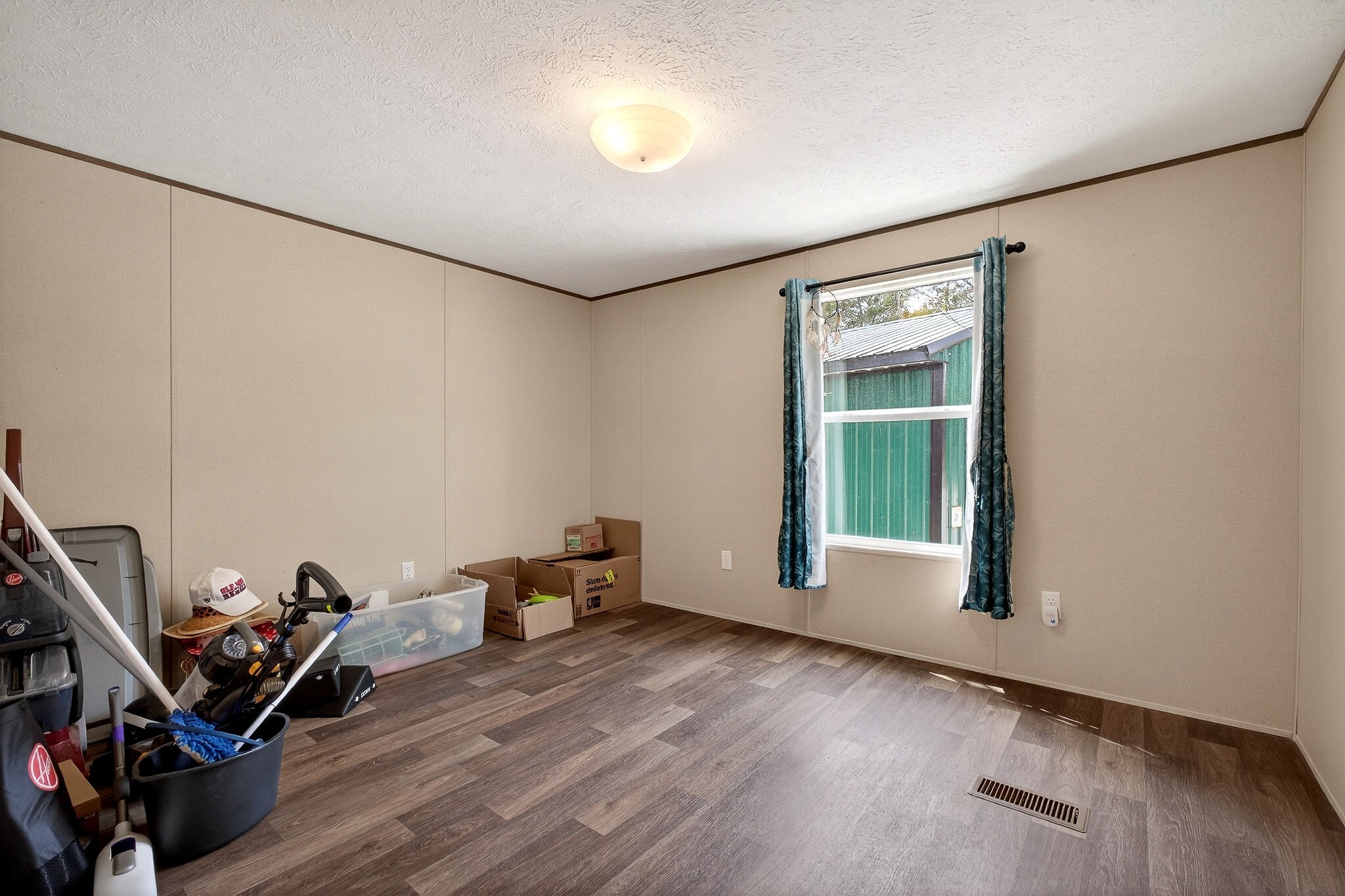1237 Ridge Road Quebeck, TN 38579 - Photo 31 of 47 a view of a room with gym equipment and wooden floor