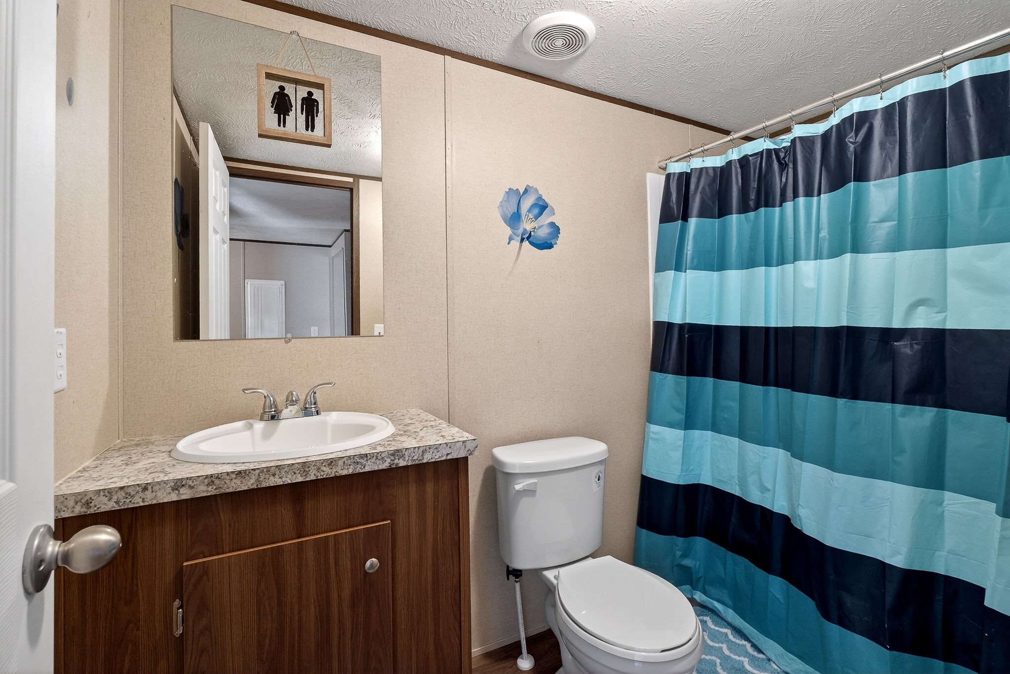 1237 Ridge Road Quebeck, TN 38579 - Photo 34 of 47 a bathroom with a sink a toilet and shower