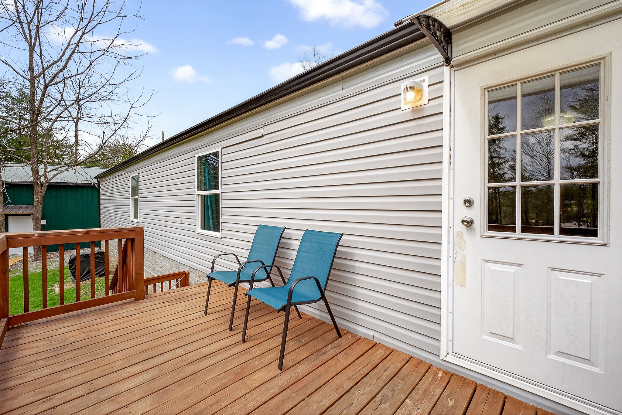 1237 Ridge Road Quebeck, TN 38579 - Photo 36 of 47 a view of a chairs on the deck