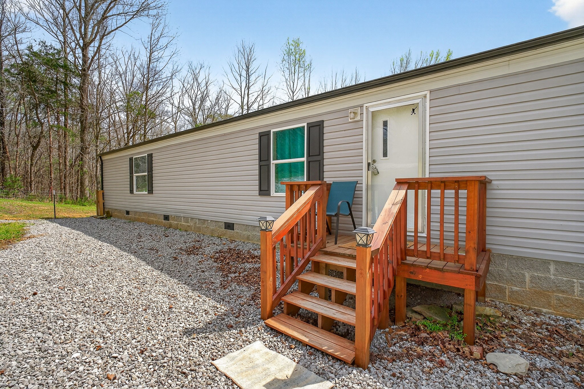 1237 Ridge Road Quebeck, TN 38579 - Photo 39 of 47 a view of a backyard with a deck and furniture