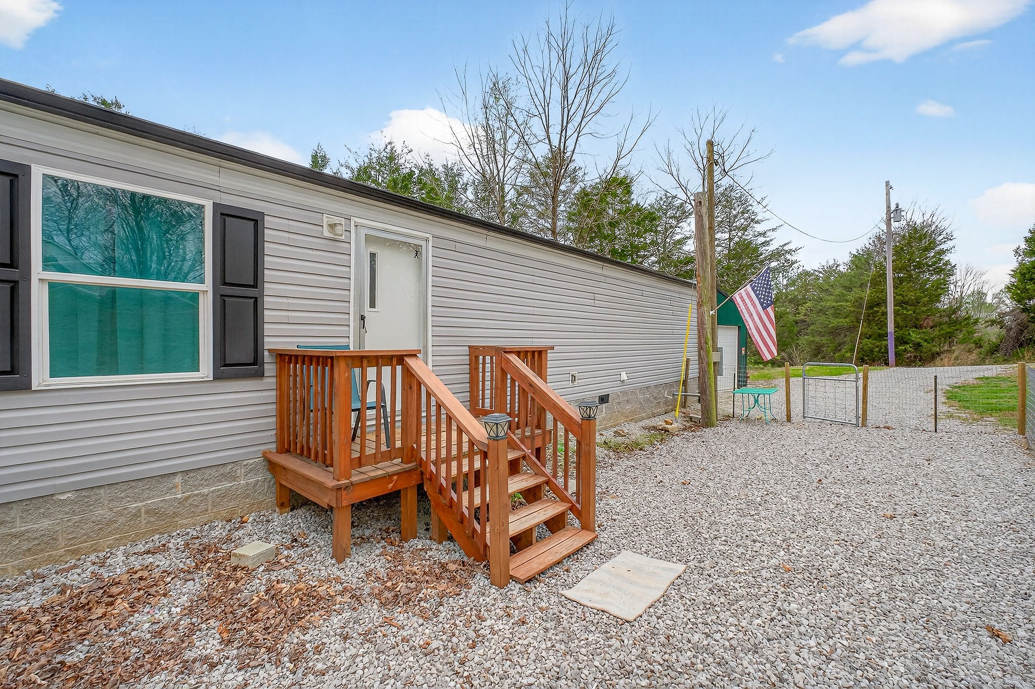1237 Ridge Road Quebeck, TN 38579 - Photo 40 of 47 a view of a house with a yard and sitting area