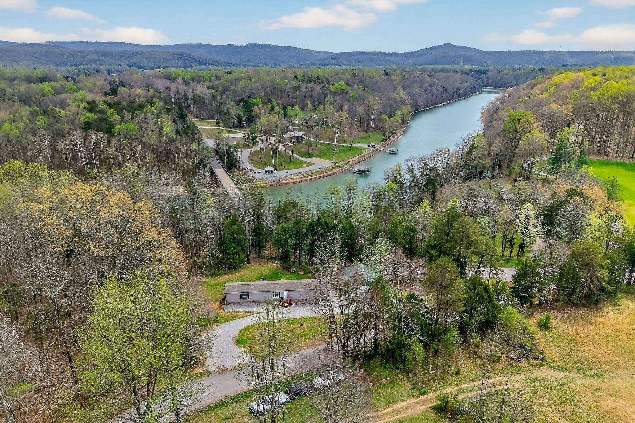 1237 Ridge Road Quebeck, TN 38579 - Photo 7 of 47 a view of a lake with a mountain in the background