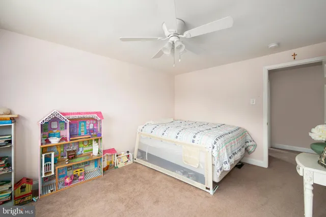 a utility room with cabinets washer and dryer