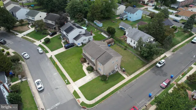 an aerial view of a city with lots of residential buildings