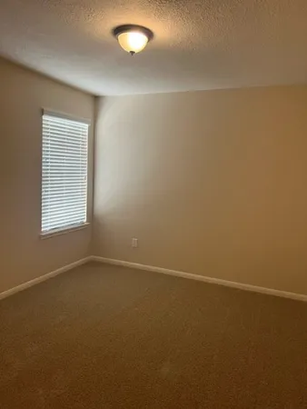 an empty room with a workbench
