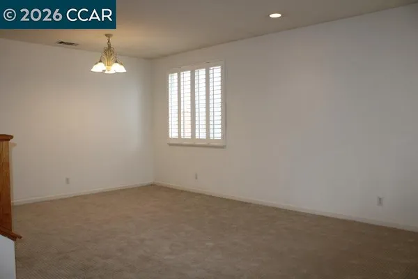 an empty room with stairs