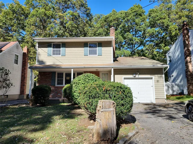 a house view with a garden space