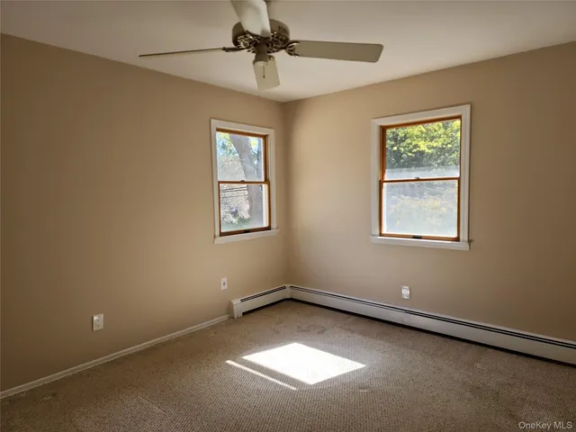 a view of a window in an empty room