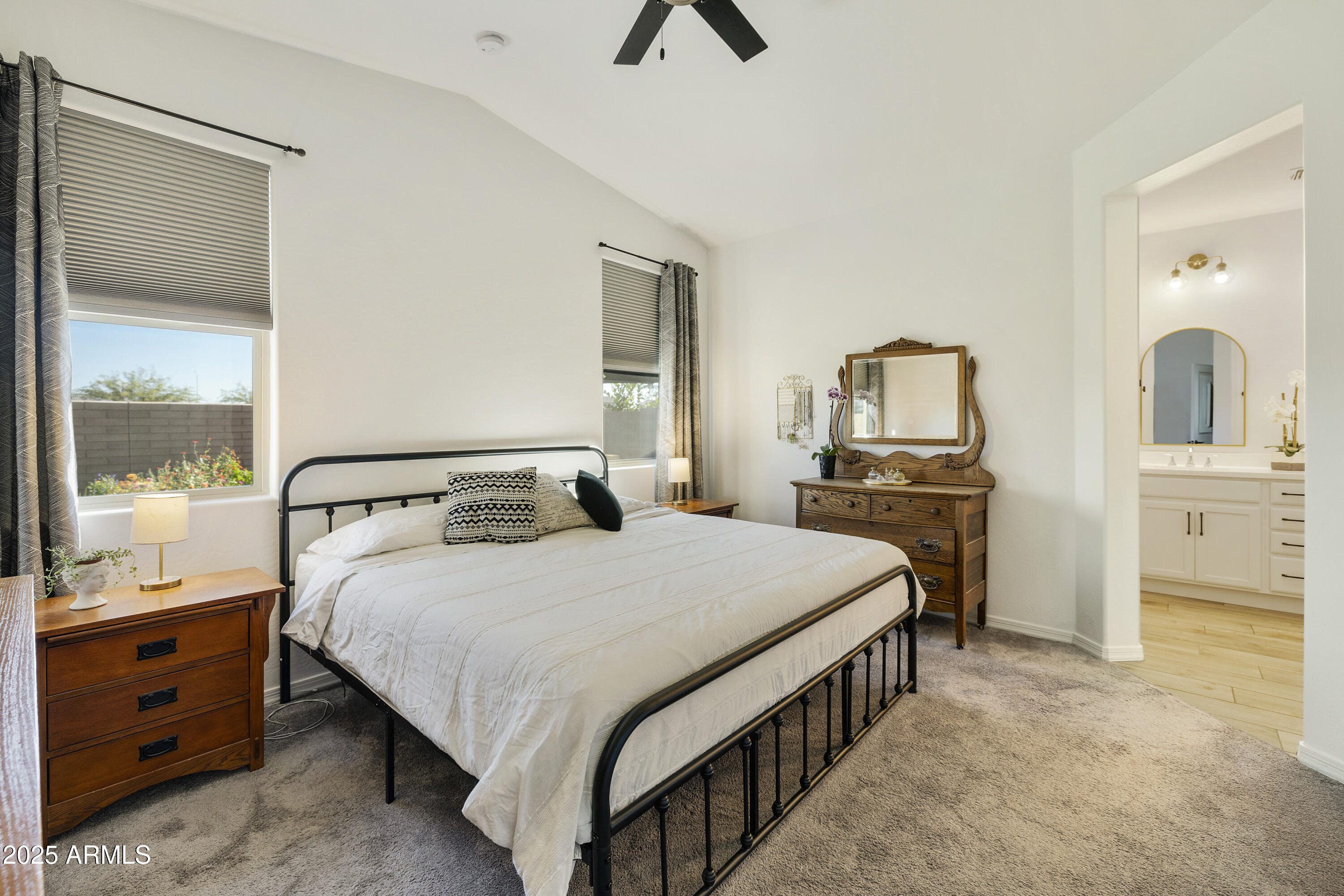 5813 South Del Rancho Mesa, AZ 85212 - Photo 14 of 47 a bedroom with a bed and a dresser